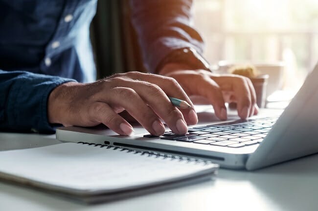 Real estate agent planning positive blog topics during COVID-19